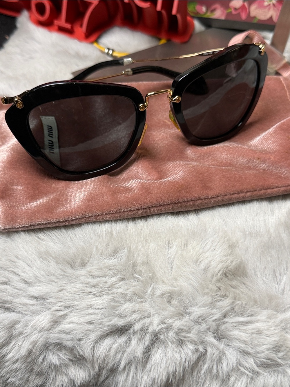 Miu Miu Black Cat-Eye Sunglasses with Gold Trim - Picture 8 of 12